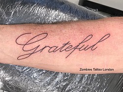 Fine line tattoo at zombies tattoo studio Dagenham