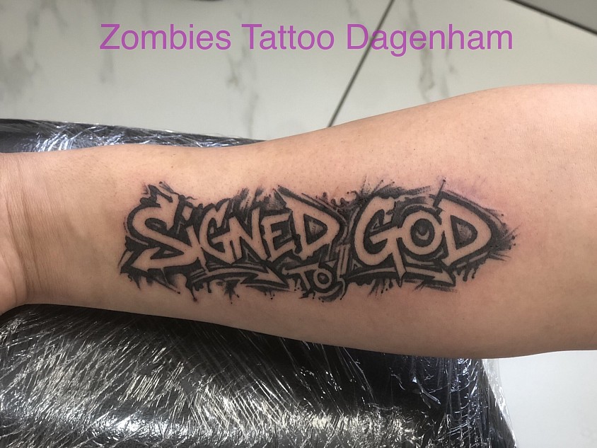 Hindu Signed to God Tattoo commentating the song by Sidhu Moosewala